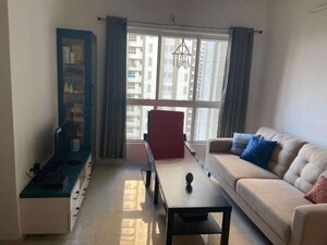 Living Room in 1 BHK Apartment at Lodha Amara, Kolshet Road – for Sale