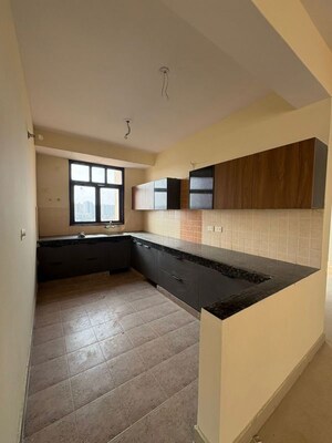 Kitchen in 4 BHK Builder Floor at BPTP Parkland Pride Phase 2, Sector 77 – for Sale