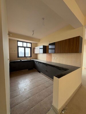Kitchen in 4 BHK Builder Floor at BPTP Parkland Pride Phase 2, Sector 77 – for Sale