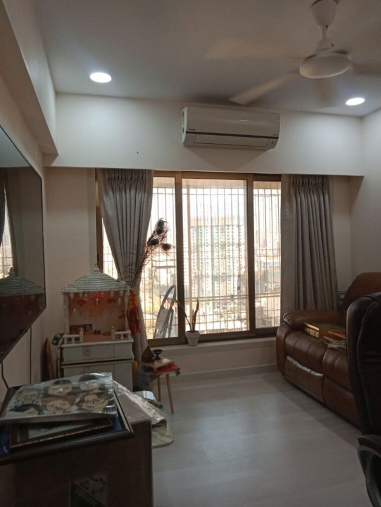 Living Room, romell-diva 3 Bedroom 970 Sq.Ft. Apartment In Malad West Mumbai 10050276