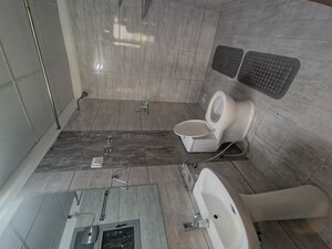 Bathroom in 3 BHK Apartment at Gulshan Bellina, Sector 16 Greater Noida – for Rent