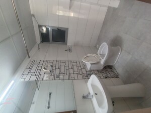 Bathroom in 3 BHK Apartment at Gulshan Bellina, Sector 16 Greater Noida – for Rent