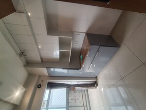 Kitchen in 3 BHK Apartment at Gulshan Bellina, Sector 16 Greater Noida – for Rent