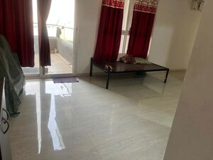 Living Room in 2 BHK Apartment at Mittal High Mont, Hinjewadi – for Rent