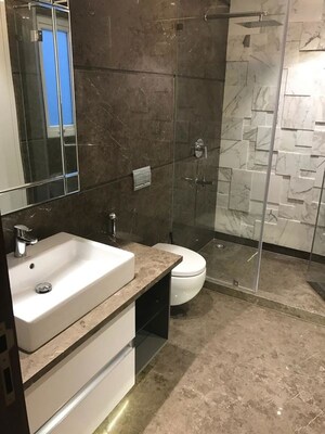Bathroom in 3 BHK Apartment at Defence Colony – for Sale