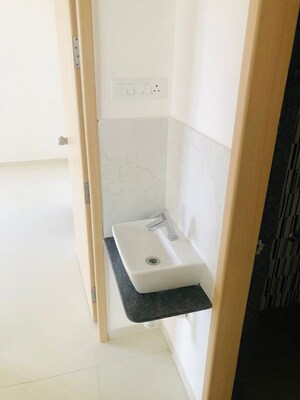 Bathroom in 2 BHK Apartment at Kohinoor Courtyard One, Wakad – for Rent