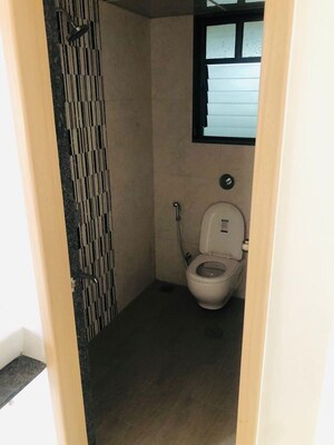 Bathroom in 2 BHK Apartment at Kohinoor Courtyard One, Wakad – for Rent