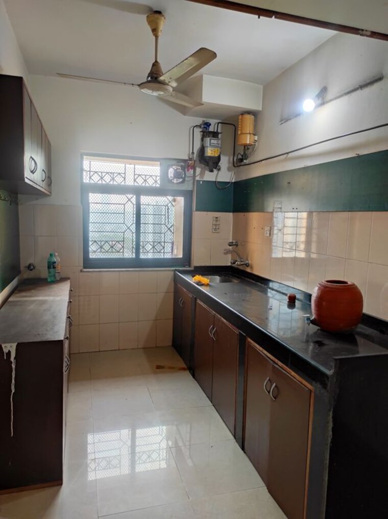Kitchen, lokhandwala-whispering-palms 2 Bedroom 630 Sq.Ft. Apartment In Kandivali East Mumbai 10055543