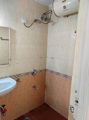 Bathroom in 2 BHK Apartment at Lokhandwala Whispering Palms, Kandivali East – for Rent