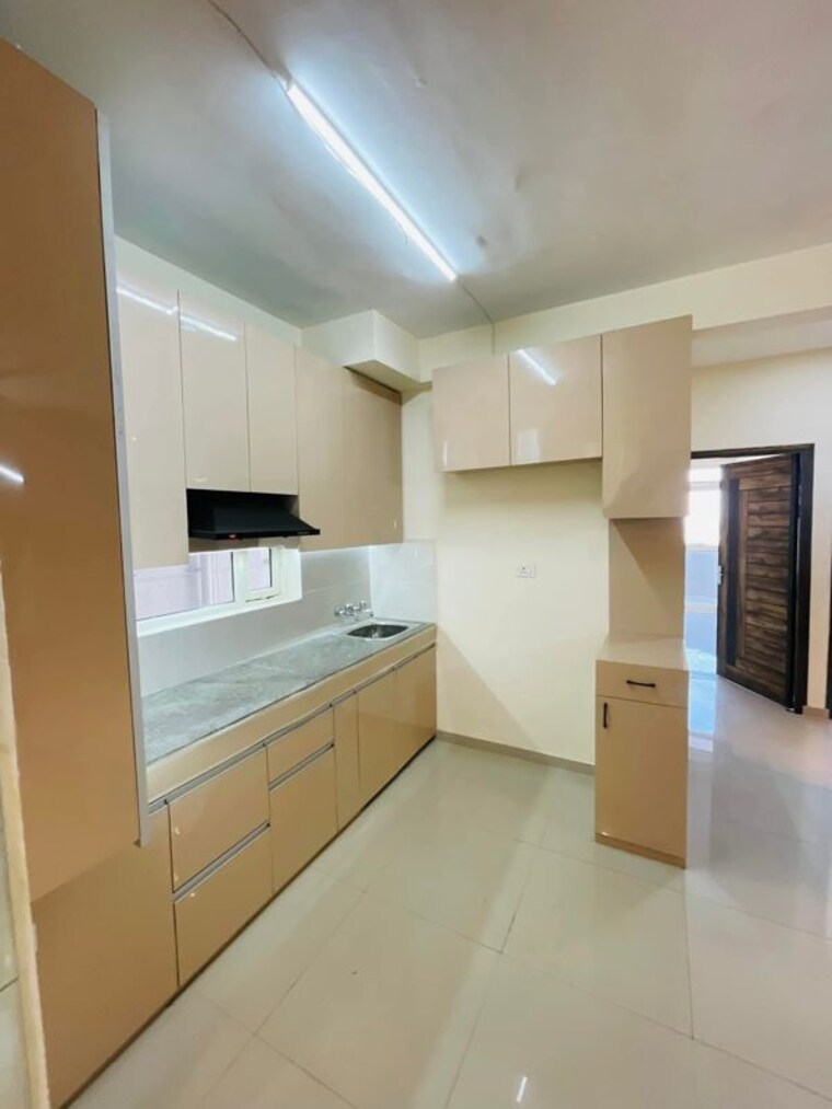 Kitchen, pyramid-midtown 2 Bedroom 678 Sq.Ft. Apartment In Sector 59 Gurgaon 10055579