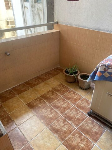 Kitchen in 2.5 BHK Apartment at Eisha Sangam, Market Yard – for Sale