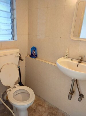 Bathroom in 1 BHK Apartment at Lokhandwala Whispering Palms, Kandivali East – for Rent