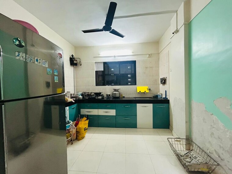 Kitchen, laxmi-ganga-heights 2 Bedroom 1000 Sq.Ft. Apartment In Anand Nagar Pune 10055603