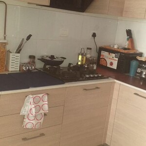 Kitchen in 2 BHK Apartment at Bhartiya Nikoo Homes Phase 2, Kannur – for Rent