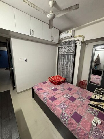 Bedroom in 2 BHK Apartment at Mantra Insignia, Mundhwa – for Rent