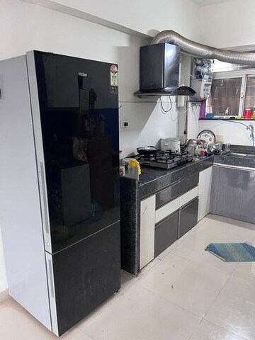 Kitchen in 2 BHK Apartment at Mantra Insignia, Mundhwa – for Rent