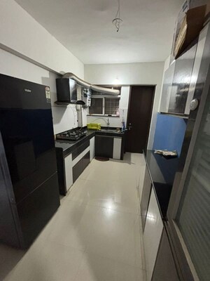 Kitchen in 2 BHK Apartment at Mantra Insignia, Mundhwa – for Rent