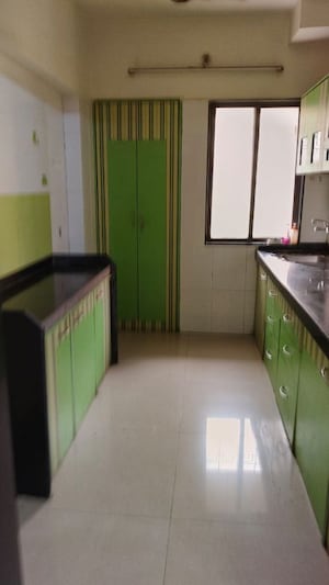 Kitchen in 2 BHK Apartment at Cosmos Classique, Ghodbunder Road – for Sale