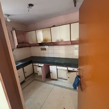Kitchen in 2.5 BHK Apartment at Alok Vihar, Sector 50 – for Sale