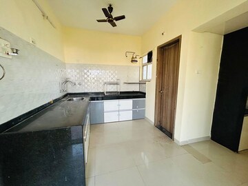 Kitchen in 2 BHK Apartment at Majestique Landmark Miami, Dhayari – for Sale