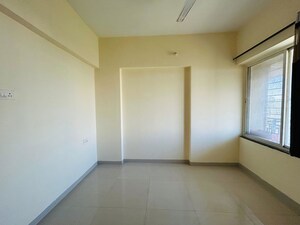 Room in 2 BHK Apartment at Majestique Landmark Miami, Dhayari – for Sale