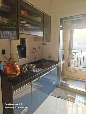 Kitchen in 2 BHK Apartment at Rustomjee Azziano Wing I, Thane West – for Sale