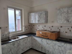 Kitchen in 4 BHK Apartment at SDS NRI Residency Omega II, Omega Ii Greater Noida – for Rent