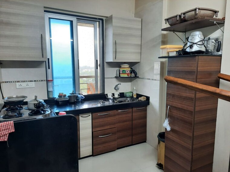 Kitchen, mayfair-akshay 4 Bedroom 1200 Sq.Ft. Apartment In Lokhandwala Mumbai 10055866