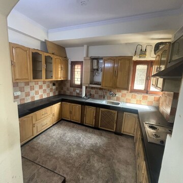 Kitchen in 4 BHK Apartment at Alok Vihar, Sector 50 – for Sale
