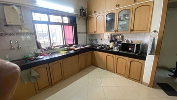 Kitchen in 4 BHK Apartment at Hastiraj Apartment Vile Parle West, Vile Parle West – for Sale