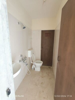 Bathroom in 2 BHK Apartment at Paradigm Zenith Pushpanjali Residency Phase III, Ghodbunder Road – for Rent
