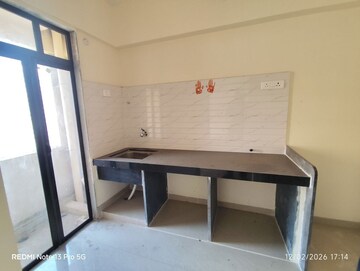 Kitchen in 2 BHK Apartment at Paradigm Zenith Pushpanjali Residency Phase III, Ghodbunder Road – for Rent