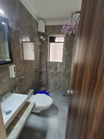 Bathroom in 2 BHK Apartment at Dn Nagar – for Sale