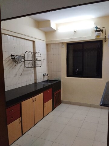 Kitchen in 2 BHK Apartment at Lok Upvan Apartment Phase 2, Vasant Vihar – for Rent