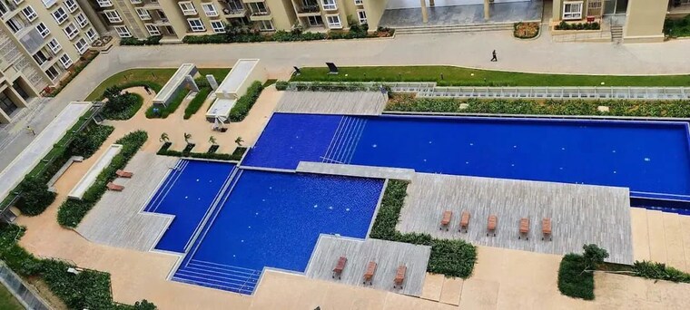 Swimming Pool, bhartiya-city-nikoo-homes-6 3.5 Bedroom 1917 Sq.Ft. Apartment In Kogilu Bangalore 10056253