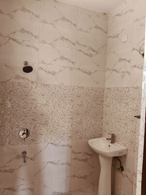 Bathroom in 3 BHK Builder Floor at Dhakoli – for Rent