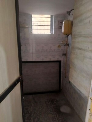 Bathroom in 1 BHK Apartment at Brightland Phase 1 CHS, Balkum Pada – for Rent