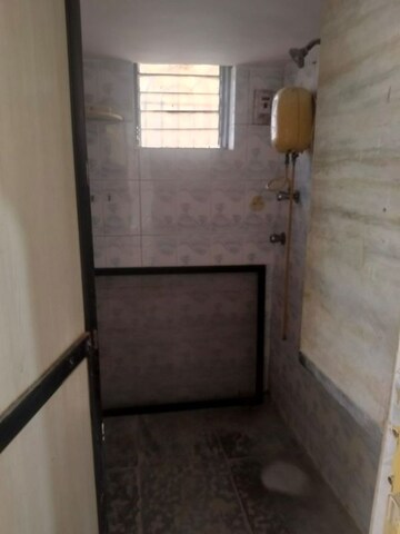 Bathroom in 1 BHK Apartment at Brightland Phase 1 CHS, Balkum Pada – for Rent