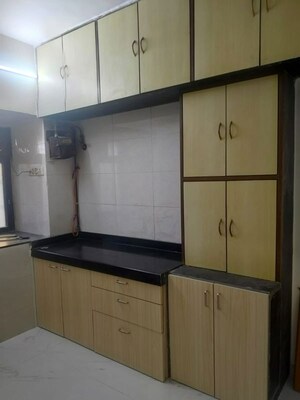 Kitchen in 1 BHK Apartment at Brightland Phase 1 CHS, Balkum Pada – for Rent
