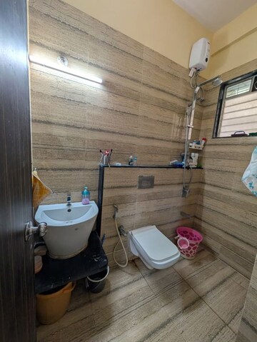 Bathroom in 2 BHK Apartment at Larkins Pride Palms, Kolshet Road – for Sale