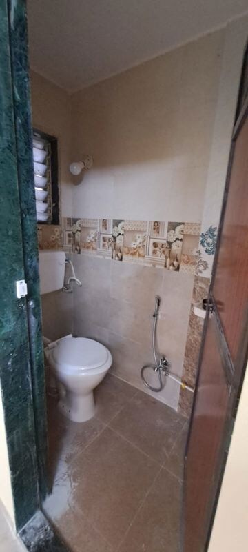 Bathroom in 2 BHK Apartment at Pranjee Garden City, Katrap – for Rent