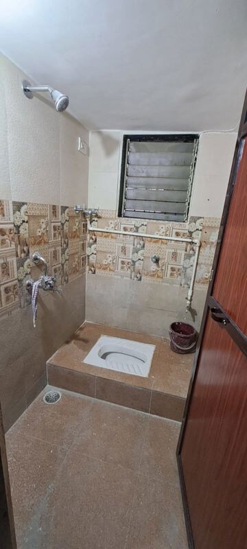 Bathroom in 2 BHK Apartment at Pranjee Garden City, Katrap – for Rent