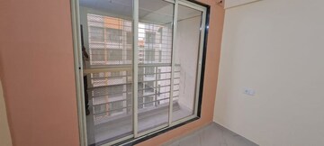 Room in 2 BHK Apartment at Pranjee Garden City, Katrap – for Rent