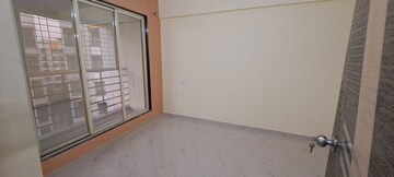 Room in 2 BHK Apartment at Pranjee Garden City, Katrap – for Rent