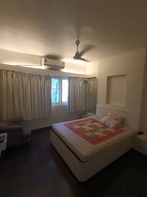 Bedroom in 3 BHK Apartment at Dharam Jyot CHS, Juhu – for Rent