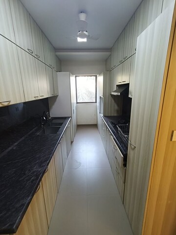 Building Lobby in 3 BHK Apartment at Dharam Jyot CHS, Juhu – for Rent