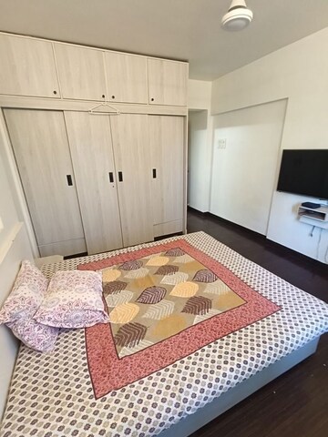 Bedroom in 3 BHK Apartment at Dharam Jyot CHS, Juhu – for Rent