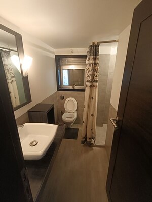 Bathroom in 3 BHK Apartment at Dharam Jyot CHS, Juhu – for Rent