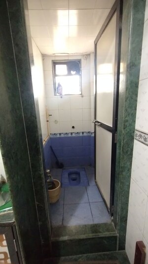 Bathroom in 1 BHK Apartment at Seawoods Sector 48 – for Sale