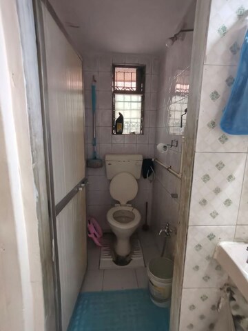 Bathroom in 1 BHK Apartment at Ashtagandha Chs, Seawoods Sector 48 – for Sale